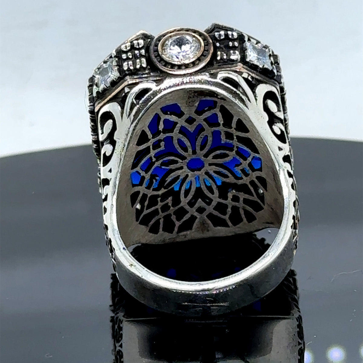 Herrenring aus Silber mit großem blauem Zirkon und Saphir