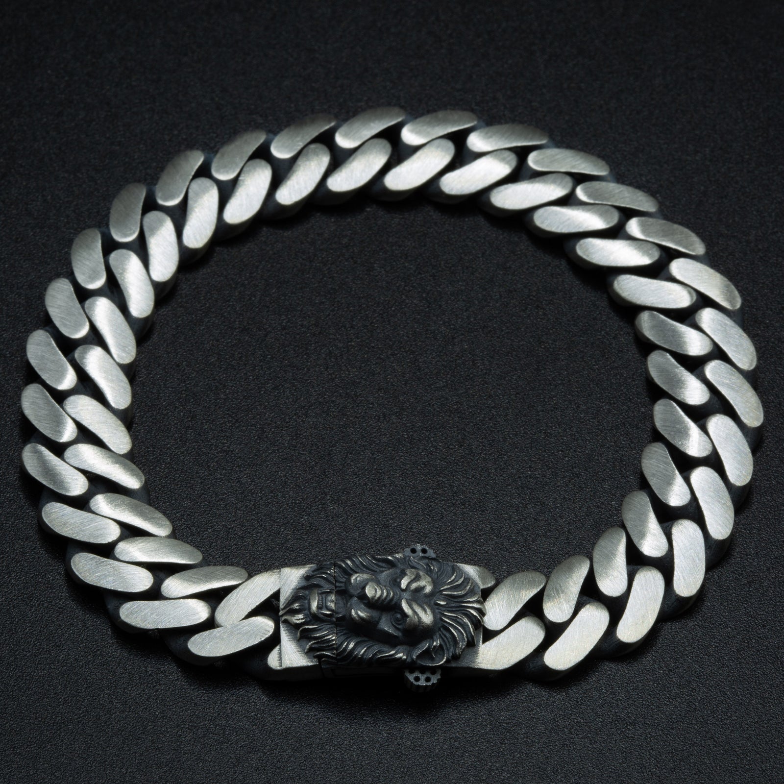 Sterling Silver Leon Figured Zodiac Curb Chain Bracelet
