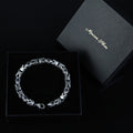 Pulsera de cadena bizantina de plata con piedras preciosas de ónix redondas de 10 mm para hombre