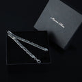 Pulsera con llavero griego de plata maciza