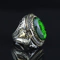 Anillo de sello Salomón grande para hombre con gema de esmeralda y figura de lobo.