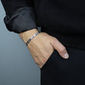 Pulsera con llavero griego de plata maciza