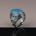Handgefertigter Herrenring mit natürlichem blauem Aquamarin