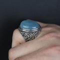 Handgefertigter Herrenring mit natürlichem blauem Aquamarin