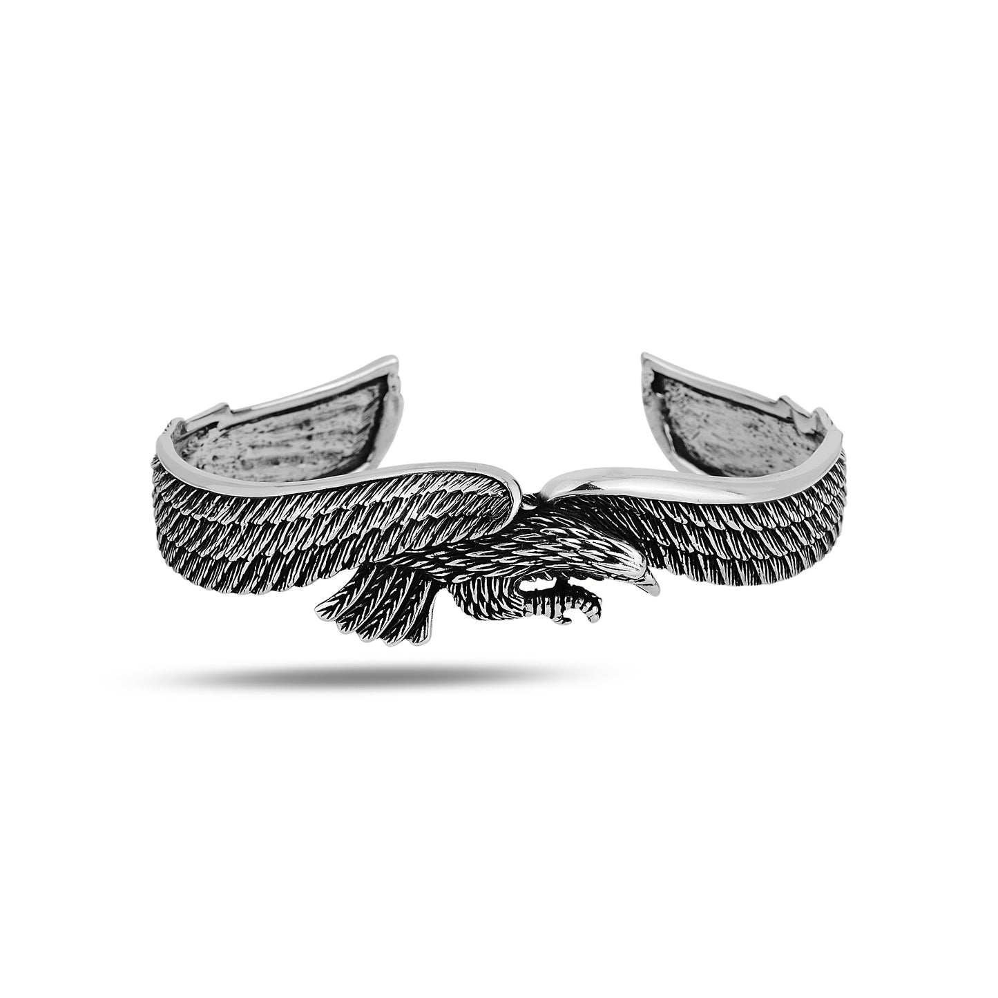 Pulsera de puño de águila hecha a mano de plata