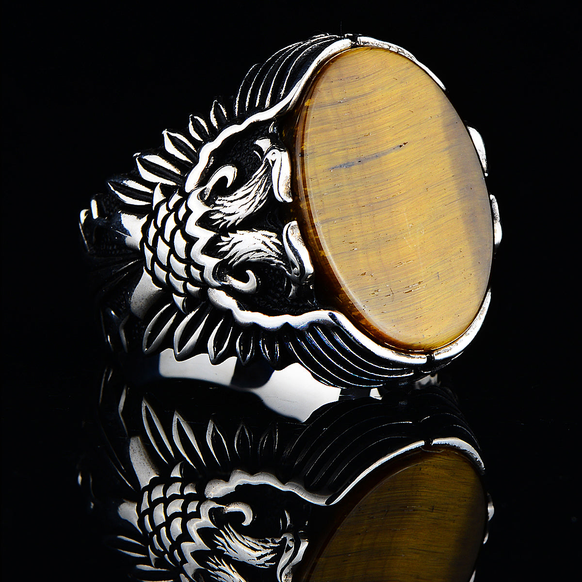 Anillo de plata hecho a mano con piedra de ojo de tigre modelo águila