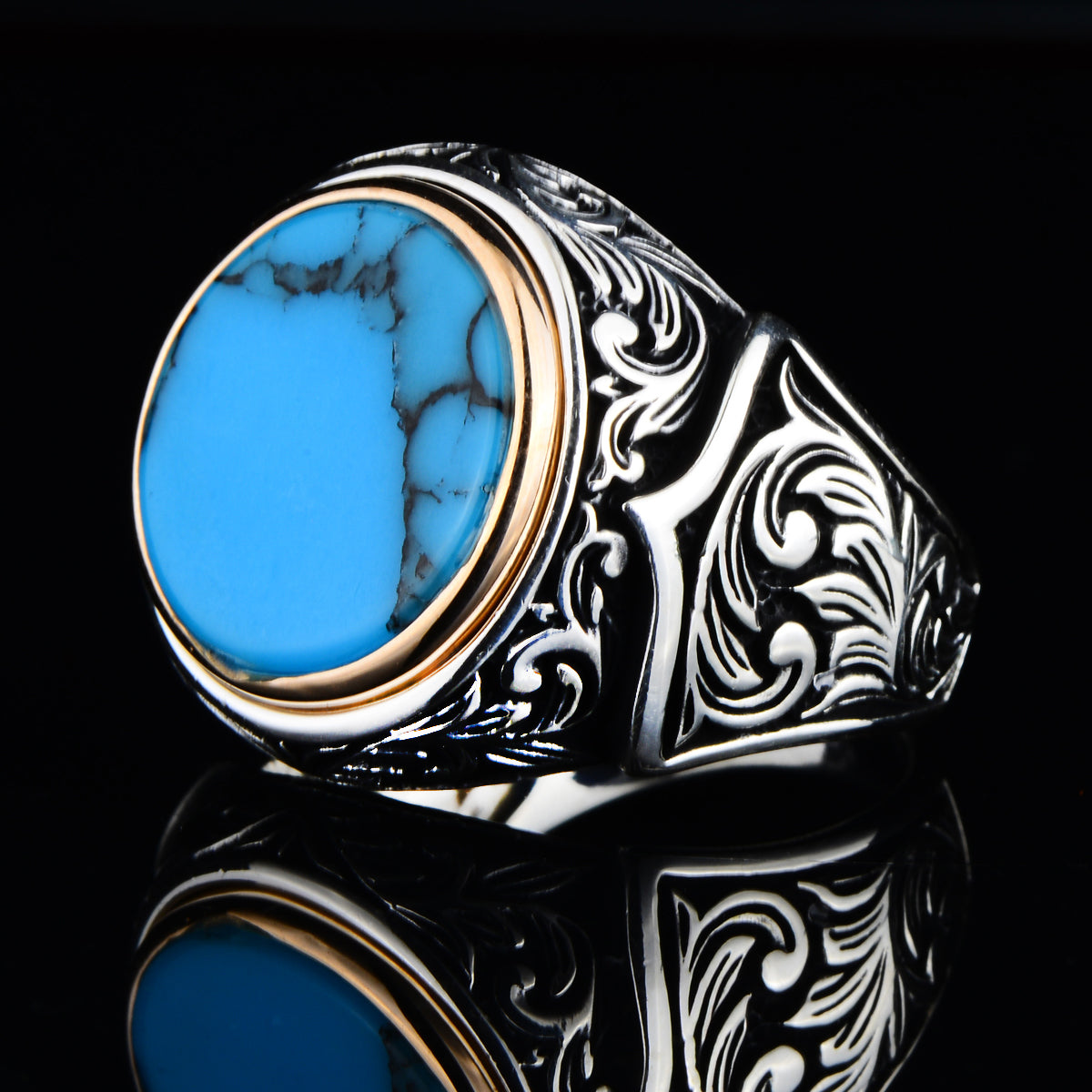 Anillo de plata con piedra turquesa redonda grabada hecha a mano