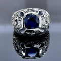 Herrenring aus 925er Silber mit handgraviertem blauem Saphir